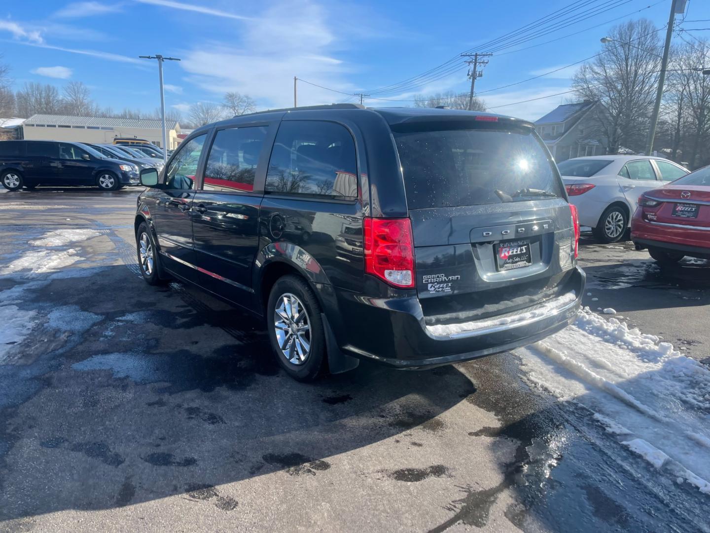 2014 Gray /Black Dodge Grand Caravan SXT (2C4RDGCG9ER) with an 3.6L V6 DOHC 24V FFV engine, 6 Speed Automatic transmission, located at 547 E. Main St., Orwell, OH, 44076, (440) 437-5893, 41.535435, -80.847855 - This 2014 Dodge Grand Caravan SXT is equipped with a rear entertainment system and STOW N GO seating, allowing for easy storage and flexibility. It also features a back-up camera, providing added convenience and safety when parking or reversing. With its versatile seating and entertainment options, - Photo#9